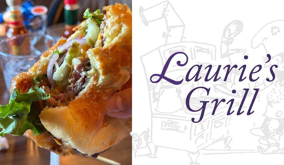 The Lauries Grill cheeseburger is a classic American dish that is sure to satisfy any craving.