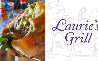 The Lauries Grill cheeseburger is a classic American dish that is sure to satisfy any craving.